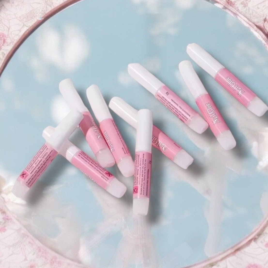 Colle à faux ongles longue tenue