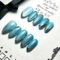 press on nails faits main réutilisables bleu cat eyes et chrome argenté