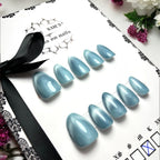 press on nails réutilisables faits main bleu cat eyes 