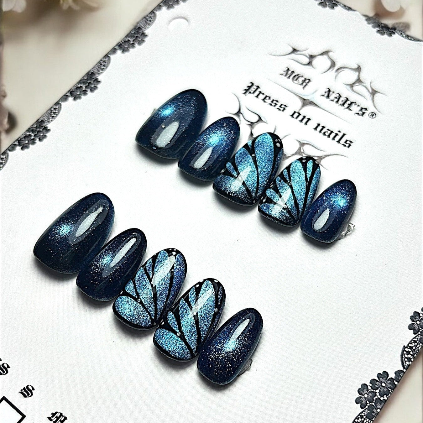 press on nails cat eyes réutilisables féérique magique papillon bleu nuit 